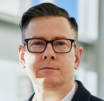 Alexander Hughes, izvršni direktor podjetja za kripto trading, portret